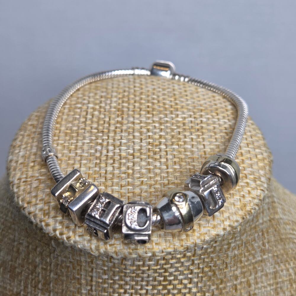 Vintage Biagi Stainless Steel 6 Charm Bracelet